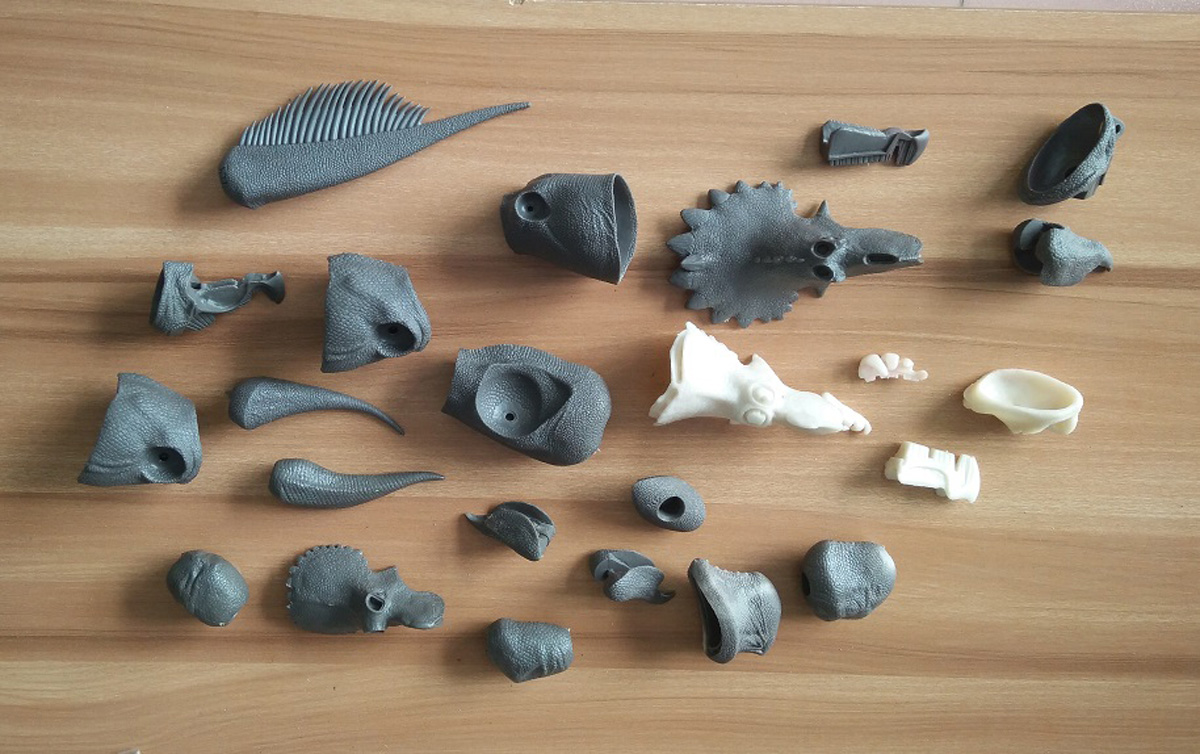 An image of the various parts involved in constructing the Beasts of the Mesozoic figures.